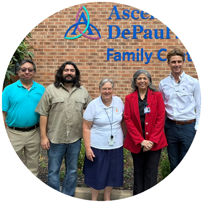 5 people standing in front of Depaul family health center