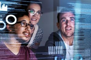 Technical team reviewing code
